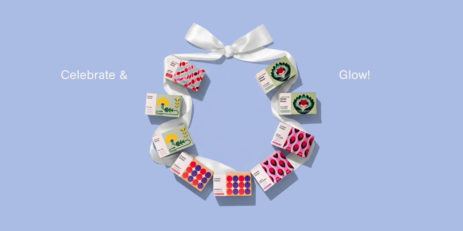 Decorative wreath made of Cosmic Doctor's products small boxes with colorful designs on a blue background.