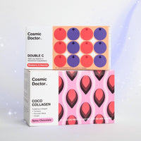 Two packaged products from Cosmic Doctor, Coco Collagen in pink and Double C in orange, positioned against a white background with a subtle gradient.
